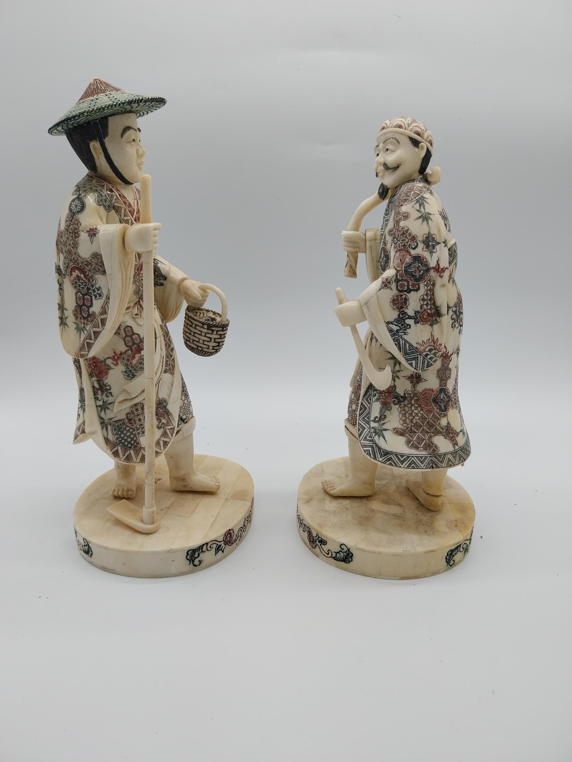 Pair of Oriental resin figures. {34 cm H x 15 cm W x 15 cm D}. - Image 2 of 4