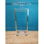 Retro acrylic valet stand {97 cm H x 40 cm W x 28 cm D}.