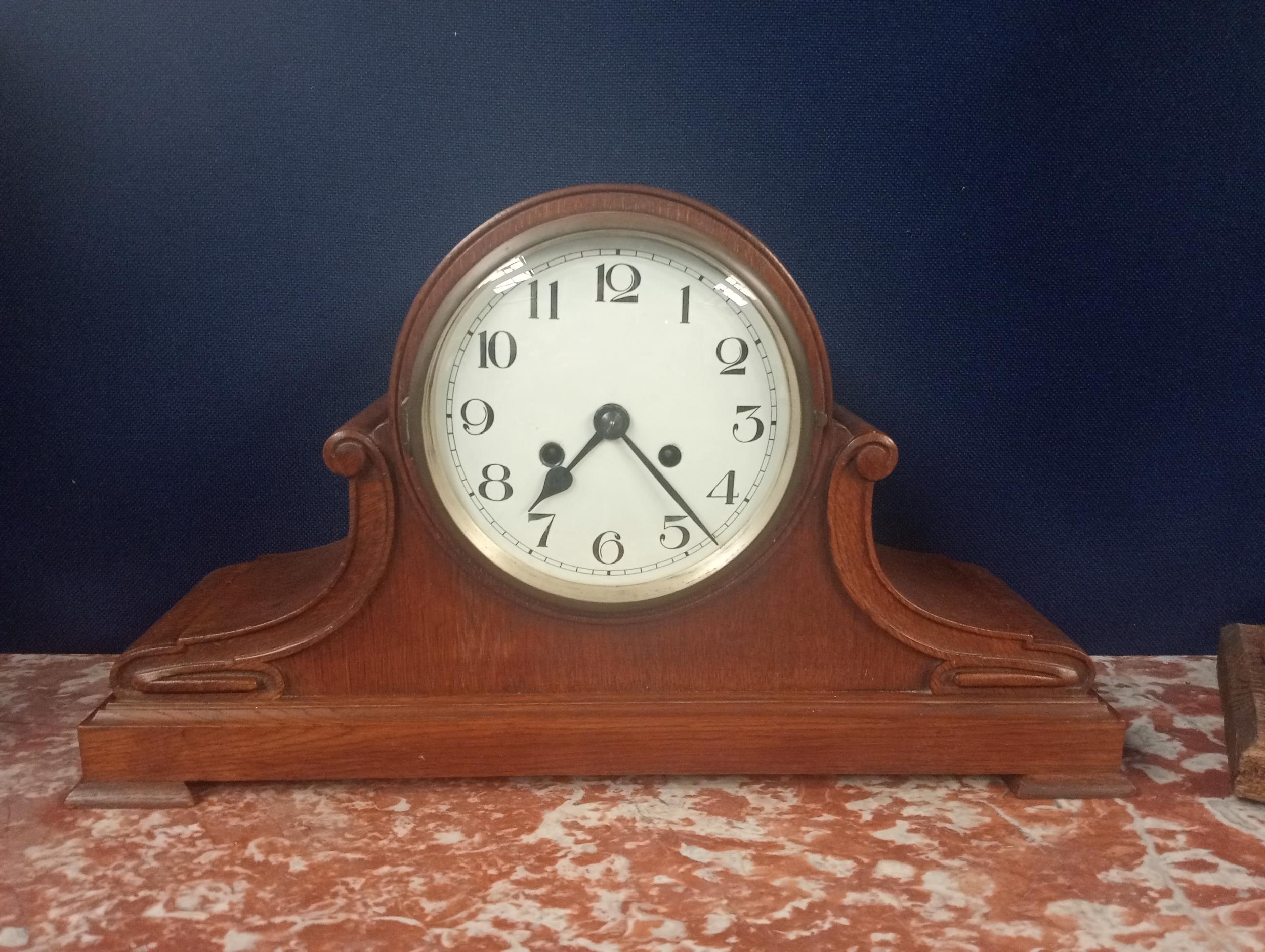 Oak mantel clock {H 30cm x W 54cm x D 15cm }.