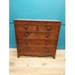 19th C. mahogany chest of drawers with two short drawers over three long drawers raised on bracket