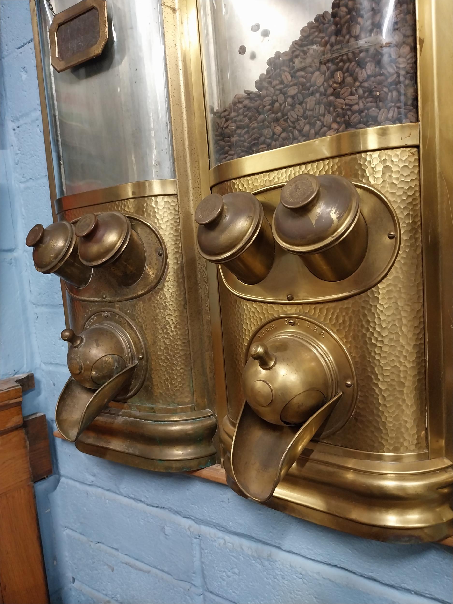 Rare set of three early 20th C. Otto Kind brass coffee dispensers. {80 cm H x 96 cm W x 35 cm D}. - Image 2 of 5