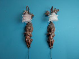 Pair of decorative cherub wall lights {56 cm H x 20 cm W x 19 cm D}.