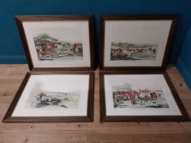 Set of four coloured Hunting prints mounted in wooden frames {76 cm H x 92 cm W}.