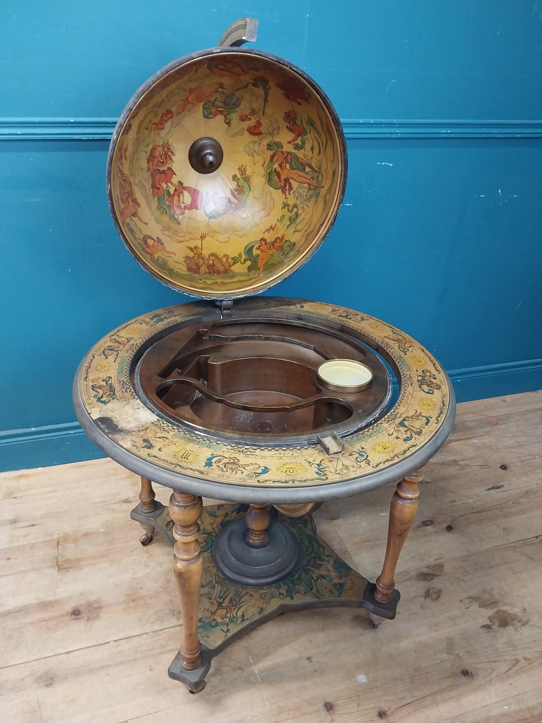 Drinks cabinet in the form of a World Globe {100 cm H x 75 cm Dia.}.