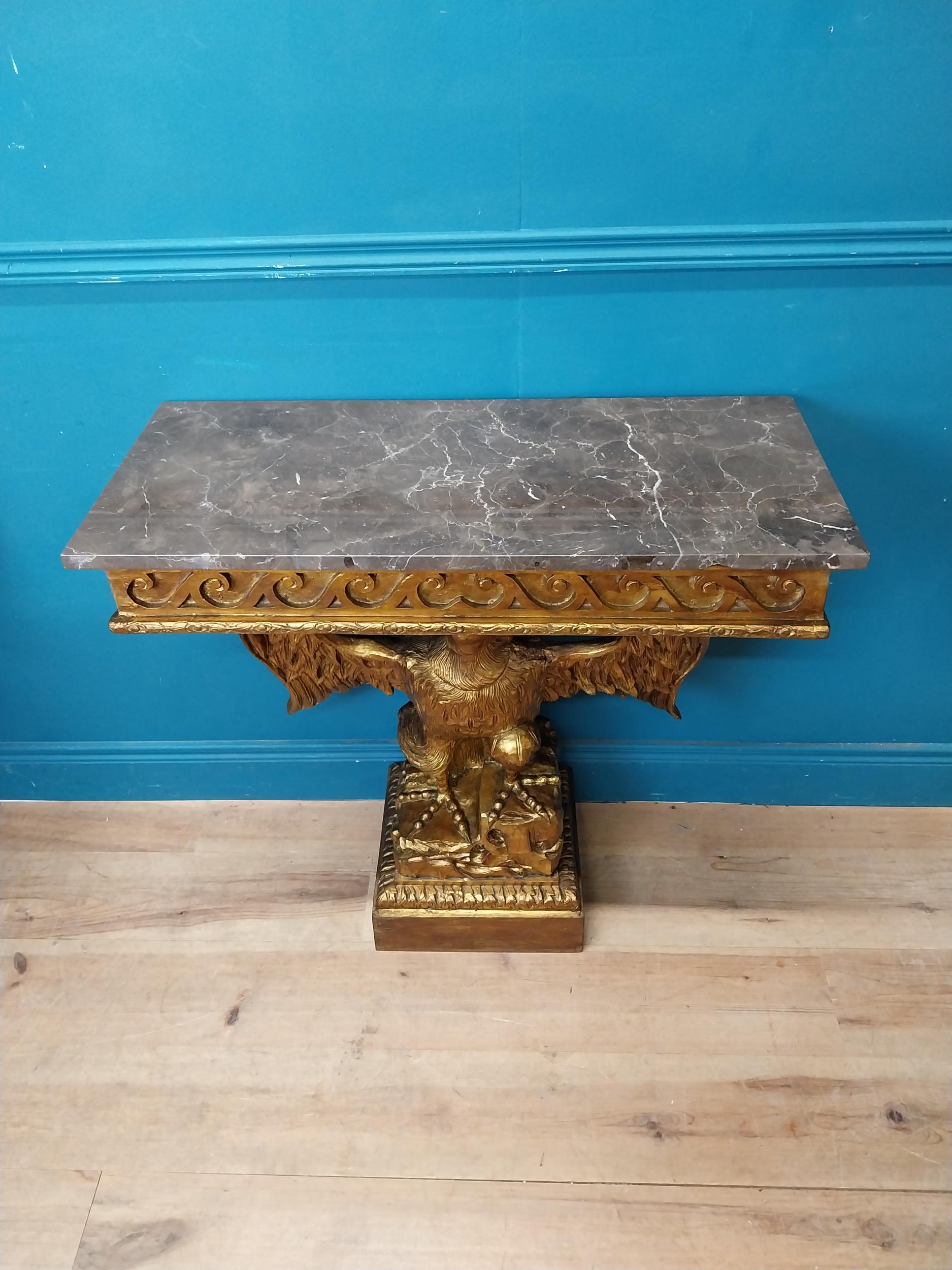 Pair of gilt cast metal marble topped console tables with outspread eagles on base in the William - Image 3 of 8