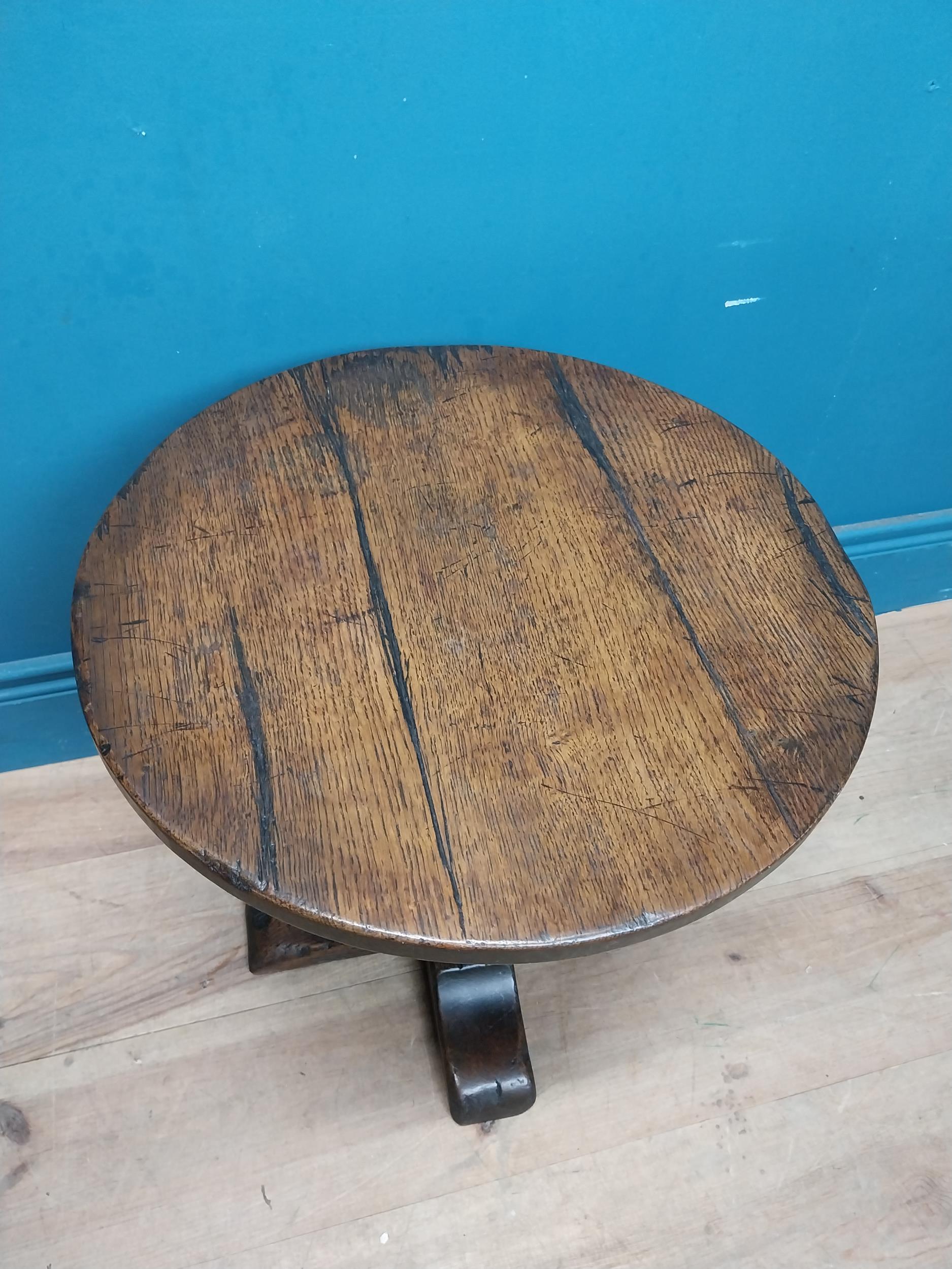 Oak wine table on turned column with four outswept shaped feet. {45 cm H x 45 cm Dia.}. - Image 3 of 6