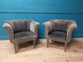 Pair of upholstered armchairs with shell back in the Art Deco style {76 cm H x 88 cm W x 70 cm D}.