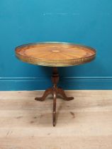 Good quality French kingwood and brass bound lamp table on turned column on three outswept feet. {48