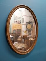 1950s gilt oval wall mirror in the Victorian style {53 cm H x 40 cm W}.