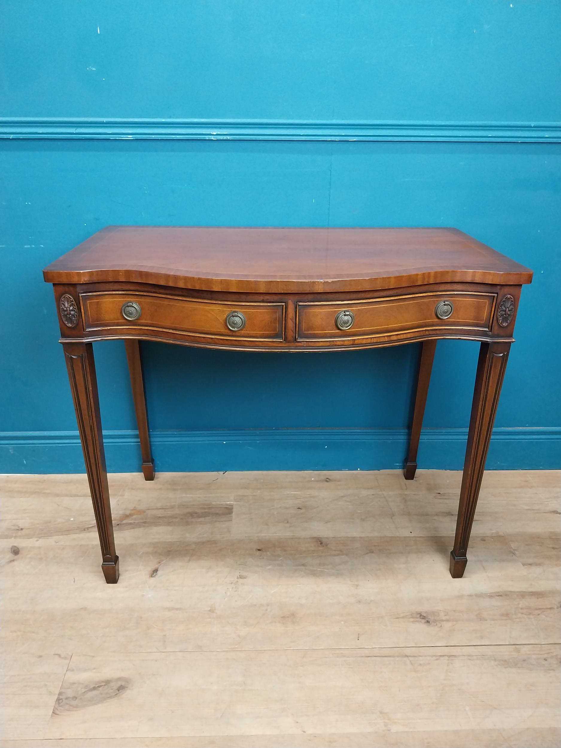 Mahogany and satinwood side table with serpentine front and two drawers in frieze raised on - Image 2 of 6