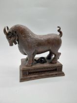 Oriental bronze model of bull. {26 cm H x 30 cm W x 15 cm D}.