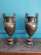 Pair of 19th C. spelter Grecian urns with Horse and Rider decoration. {47 cm H x 21 cm Dia.}.