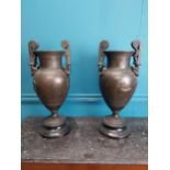 Pair of 19th C. spelter Grecian urns with Horse and Rider decoration. {47 cm H x 21 cm Dia.}.