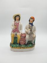 19th C. Tam O'Shanter and Souter Johnny Staffordshire figure. {35 cm H x 26 cm W x 12 cm D].