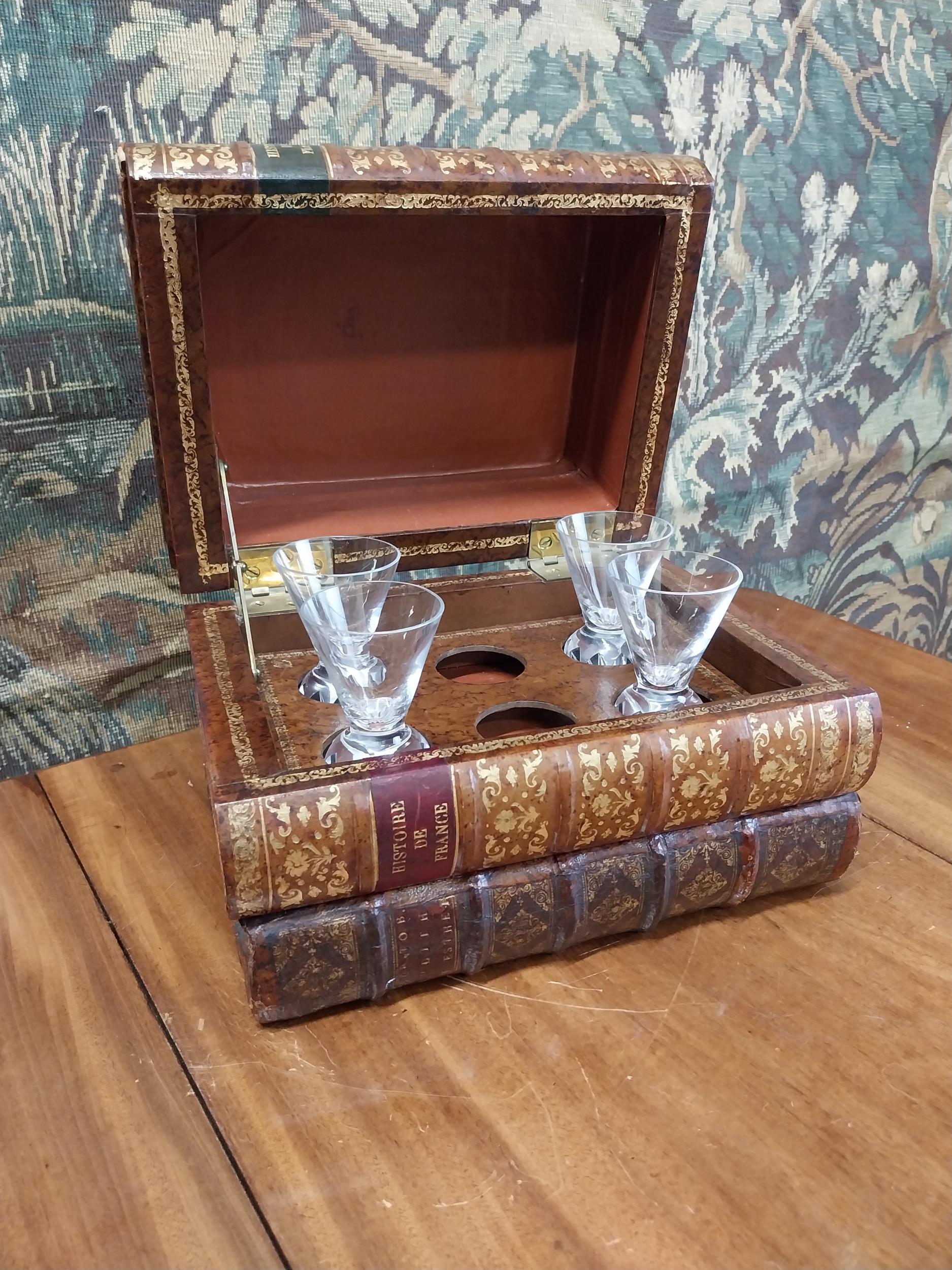 Early 20th C. decanter box in the form of books {19 cm H x 26 cm W x 21 cm D}.