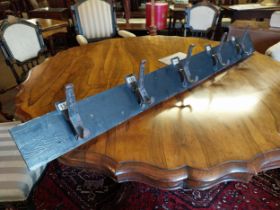 Early 20th C. wall coat rack {17 cm H x 131 cm W}.