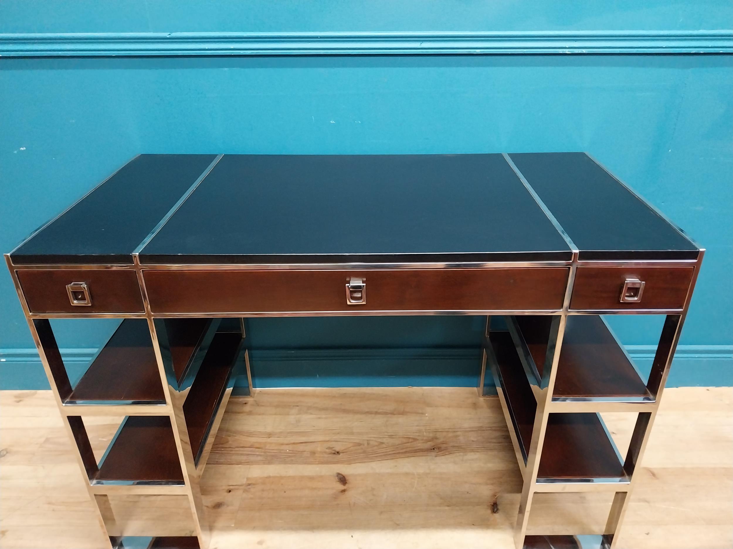 Exceptional quality chrome and cherrywood designer desk with leather top and two short drawers and