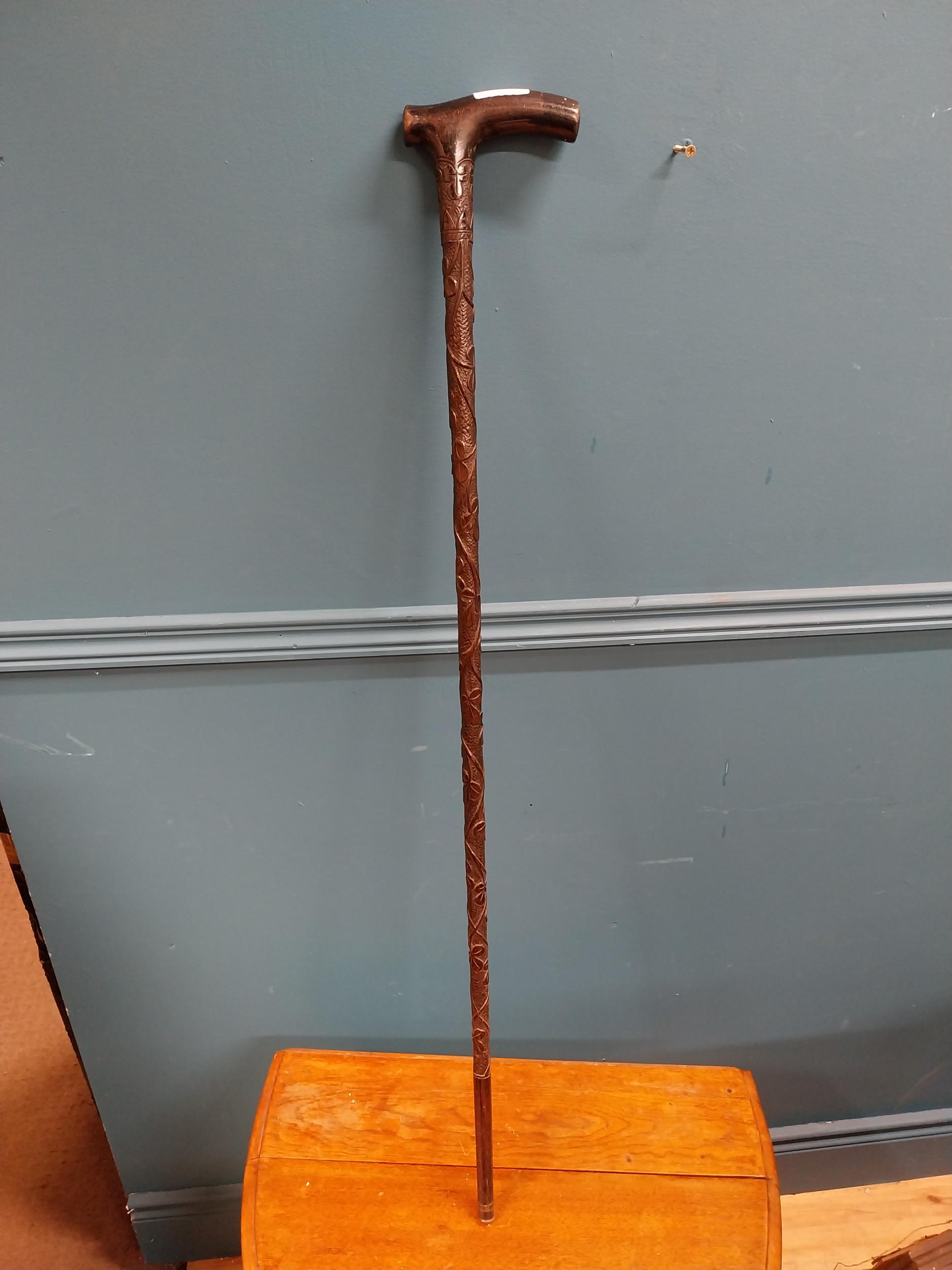 19th C. bog oak walking stick decorated with shamrocks. {94 cm H x 12 cm W}