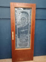 Wooden door with etched glass design of woman and birds {H 203cm x W 81cm}.