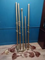 Five gilded wooden curtain poles with ties. {114 cm L}, {209 cm L}. {190 cm L} and {210 cm L}