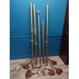 Five gilded wooden curtain poles with ties. {114 cm L}, {209 cm L}. {190 cm L} and {210 cm L}