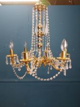 French brass and crystal glass six branch chandelier. {76 cm H x 54 cm Dia.}.