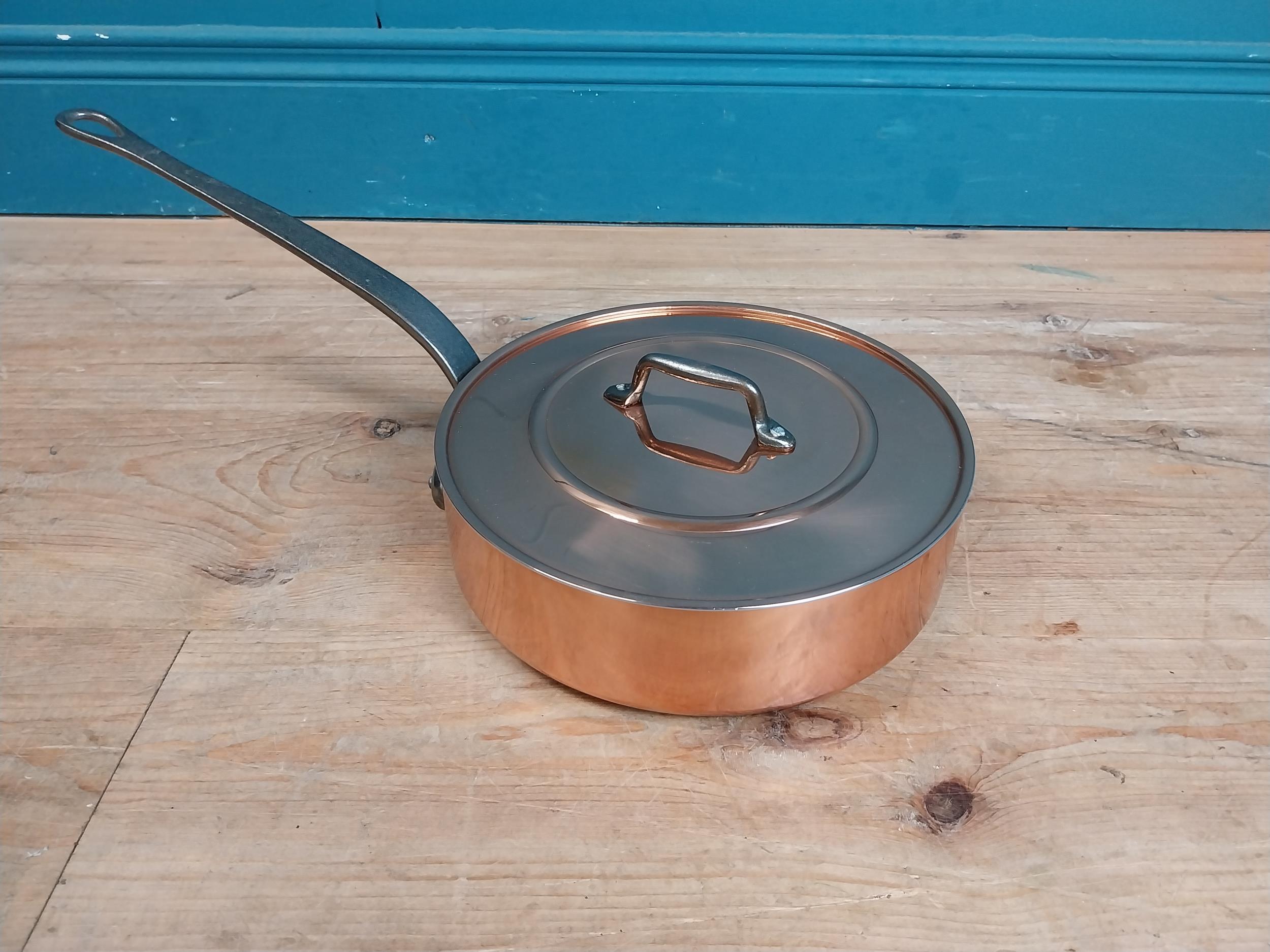 Good quality copper lidded saucepan. {17 cm H x 50 cm W x 25 cm D}.