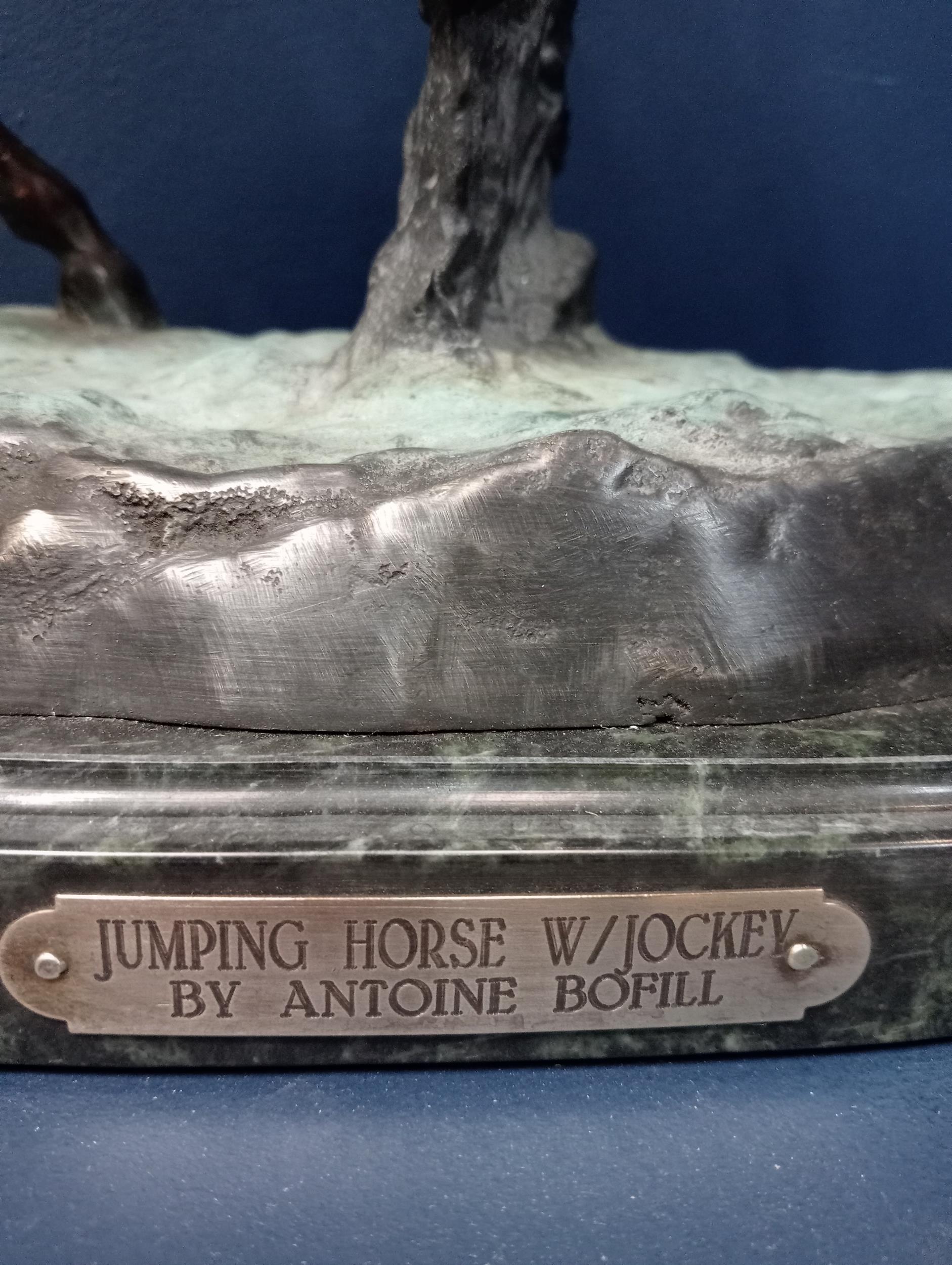 Bronze model of a horse and jockey mounted on marble base {H 43cm x W 36cm x D 22cm }. - Image 5 of 5