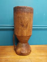 Stained pine decorative carved vase with metal handle. {44 cm H x 18 cm W x 18 cm D}.