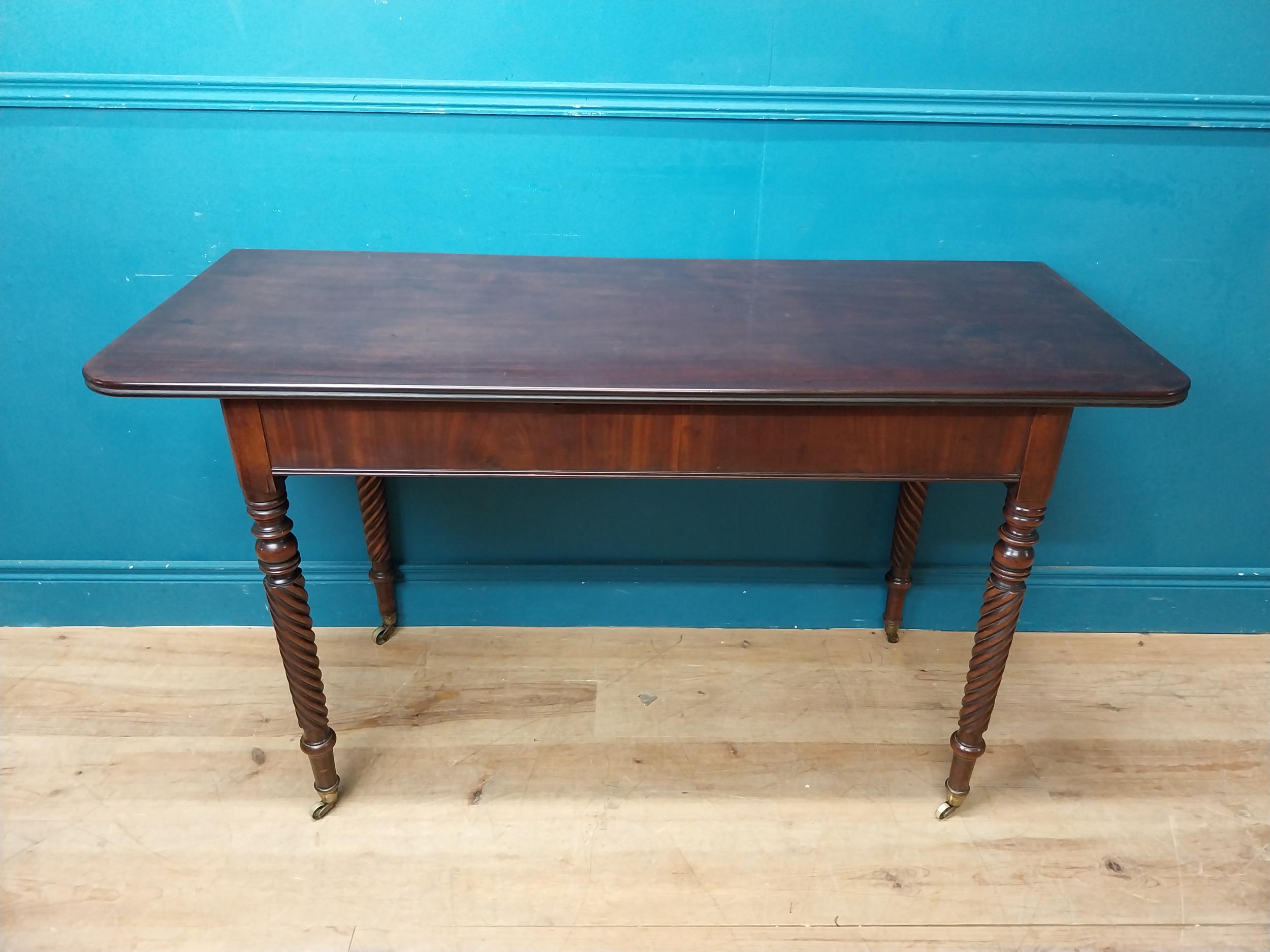 Regency mahogany side table raised on four turned legs. {74 cm H x 132 cm W x 52 cm W}. - Image 2 of 4