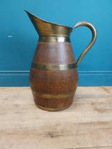 Large 19th C. oak and brass bound water jug {56 cm H x 44 cm W x 30 cm D}.