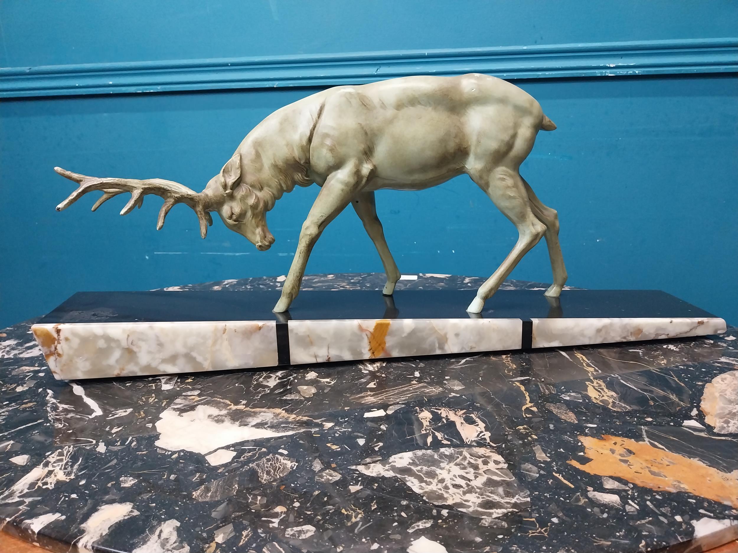 Art Deco spelter Stag on marble base. {24 cm H x 60 cm W x 16 cm D}.