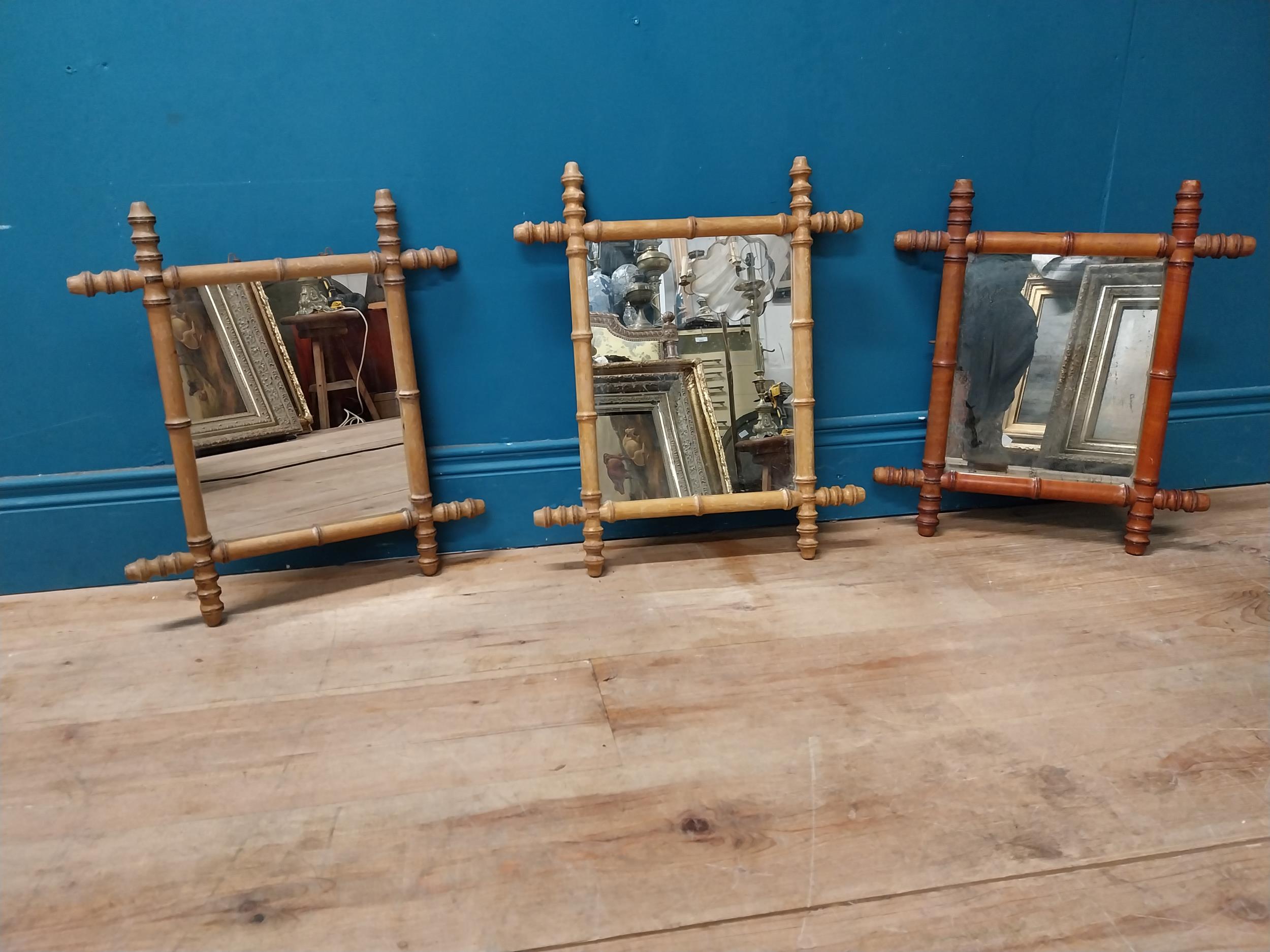 Three early 20th C. faux bamboo pine wall mirrors {52 cm H x 42 cm W and 47 cm H x 41 cm W}.