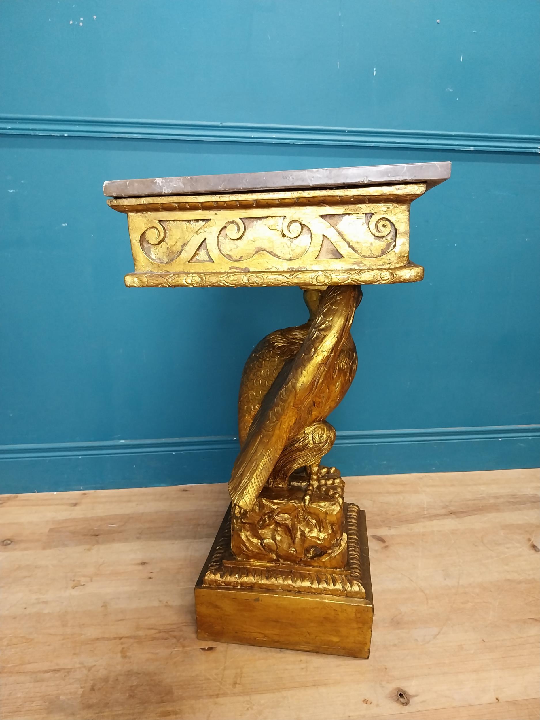 Pair of gilt cast metal marble topped console tables with outspread eagles on base in the William - Image 6 of 8