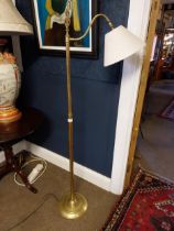 Edwardian brass floor lamp with cloth shade {150 cm H x 42 cm W x 26 cm D}.