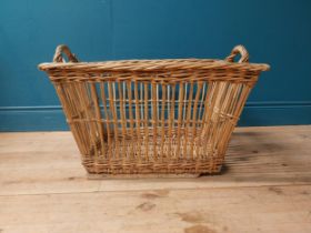 Early 20th C. wicker basket with handles. {46 cm H x 69 cm W x 50 cm D}.