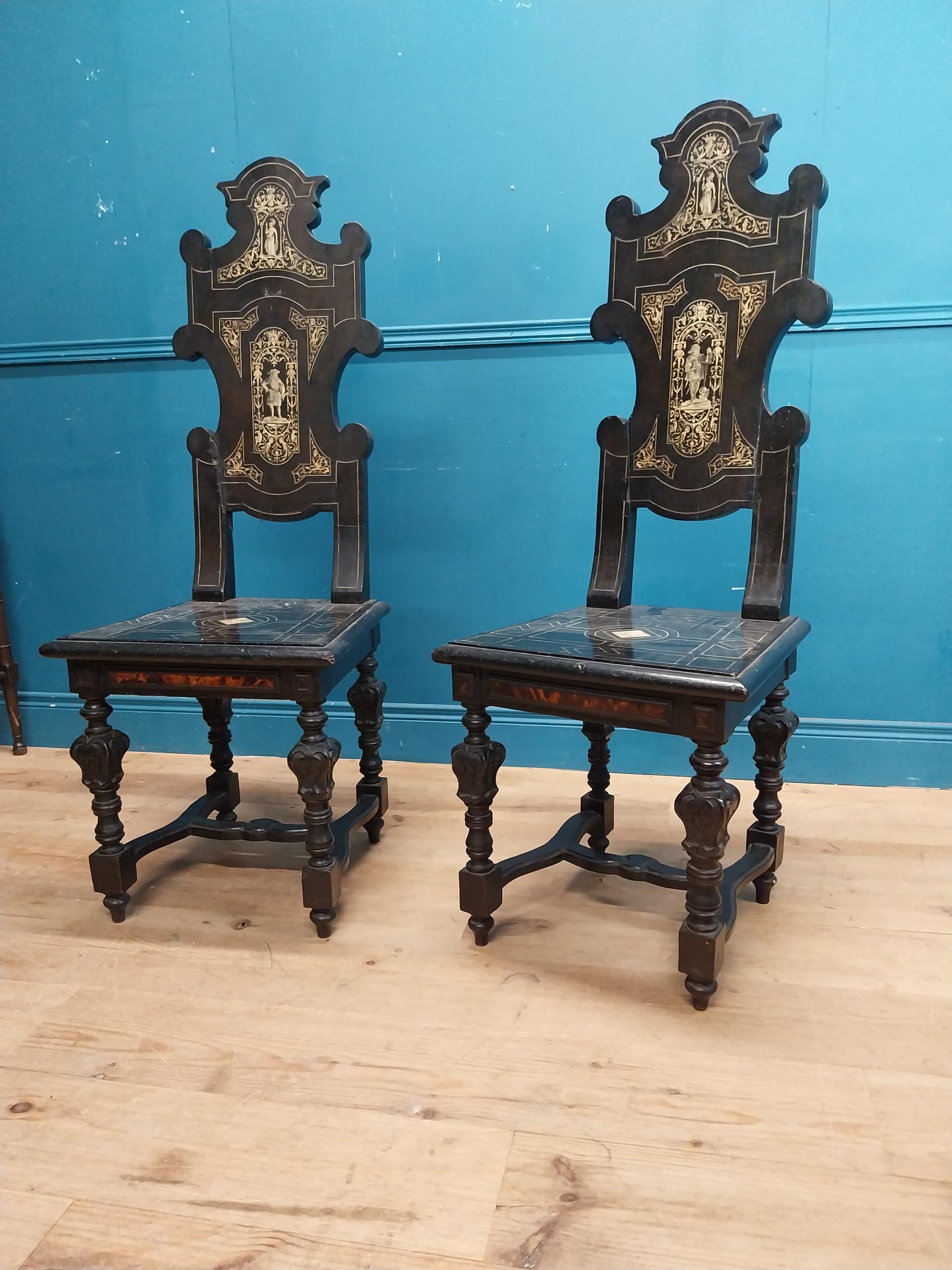 Pair of Aesthetic Movement ebonised hall chairs with inlaid bone decoration of Grecian imagery. {126 - Image 3 of 16