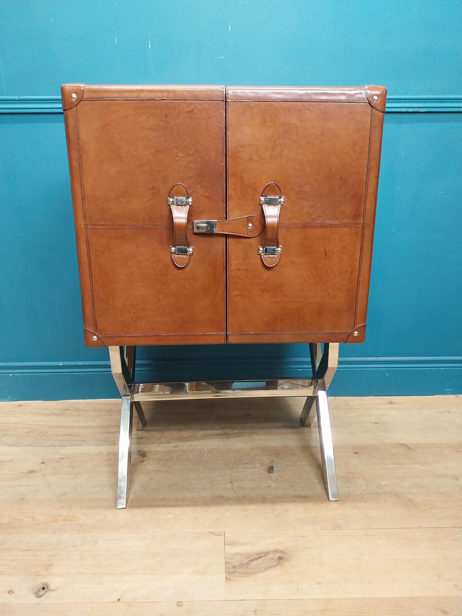 Leather and chrome bar the two doors enclosing shelves pigeon holes and a drawer, raised on X - - Image 5 of 12