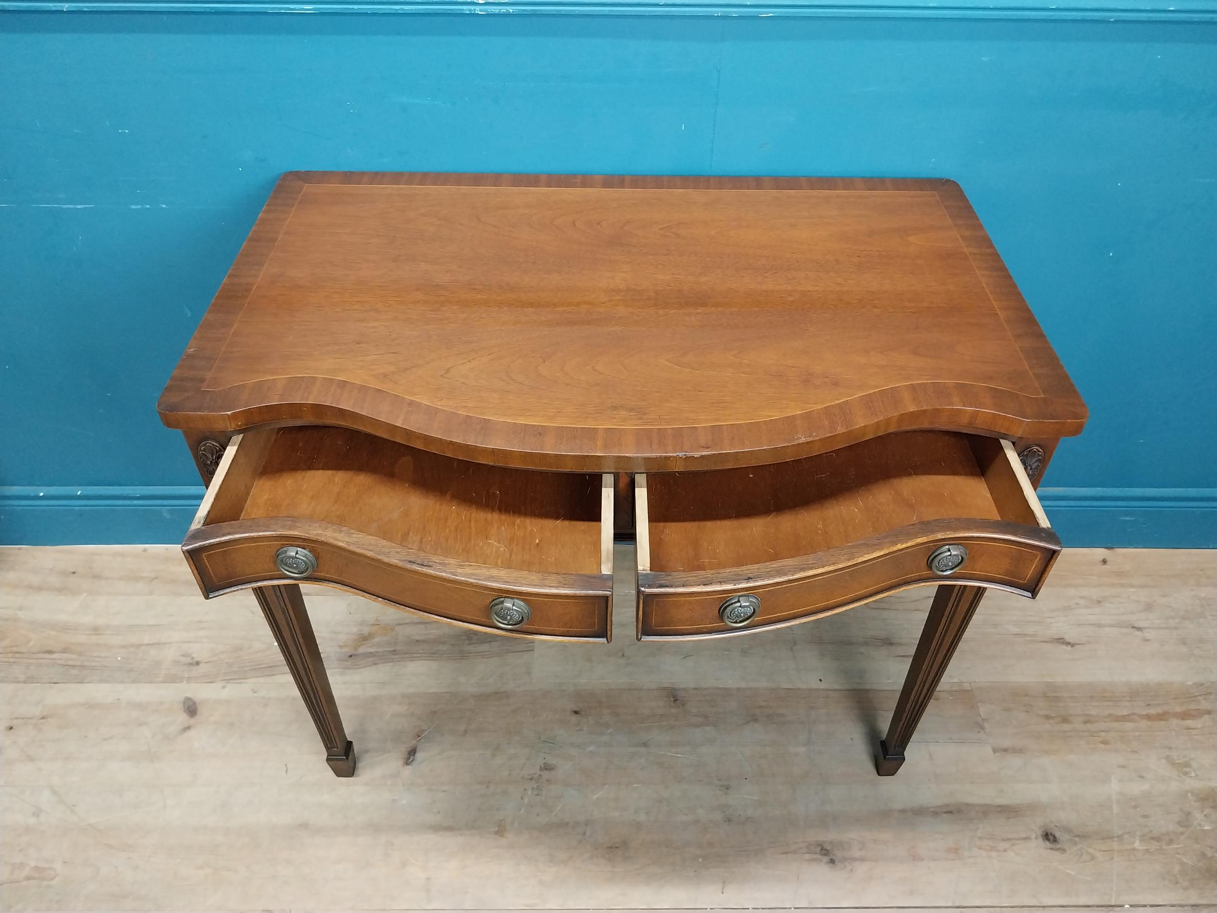 Mahogany and satinwood side table with serpentine front and two drawers in frieze raised on - Image 3 of 6