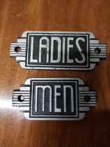 Pair of cast iron Ladies and Men signs in the Art Deco style {7 cm H x 18 cm W}.