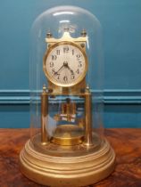 Edwardian brass skeleton clock under glass dome. {28 cm H x 18 cm Dia.}.