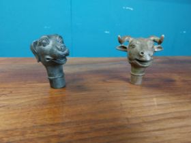 Two bronze walking stick tops {7 cm H x 7 cm W x 5 cm D}.