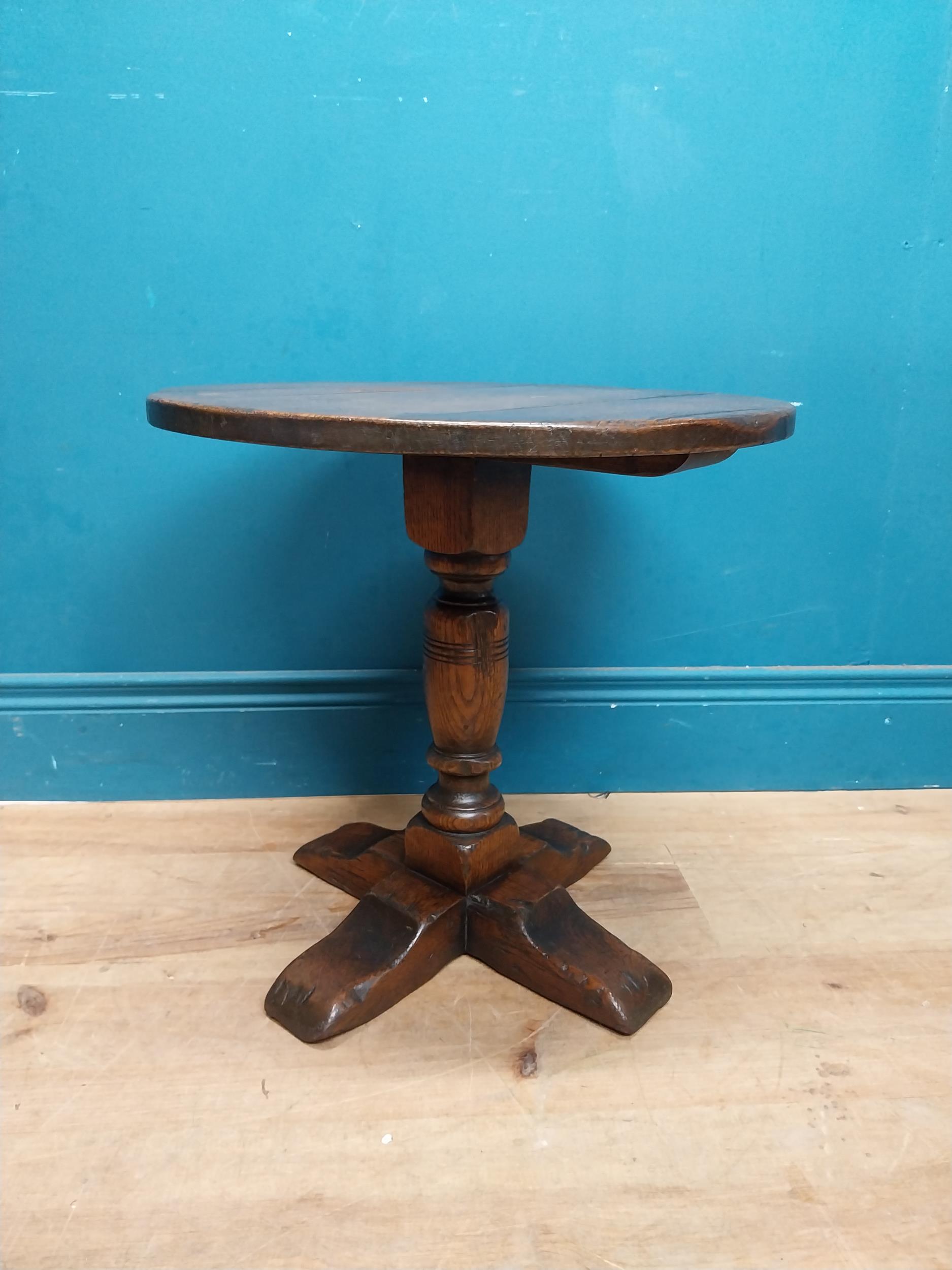 Oak wine table on turned column with four outswept shaped feet. {45 cm H x 45 cm Dia.}. - Image 5 of 6