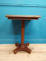 19th C. mahogany lamp table with brass gallery on single column on platform base. {77 cm H x 52 cm W