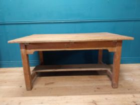 Early 20th C. pine kitchen table on square legs and single stretcher. {74 cm H x 153 cm W x 101 cm