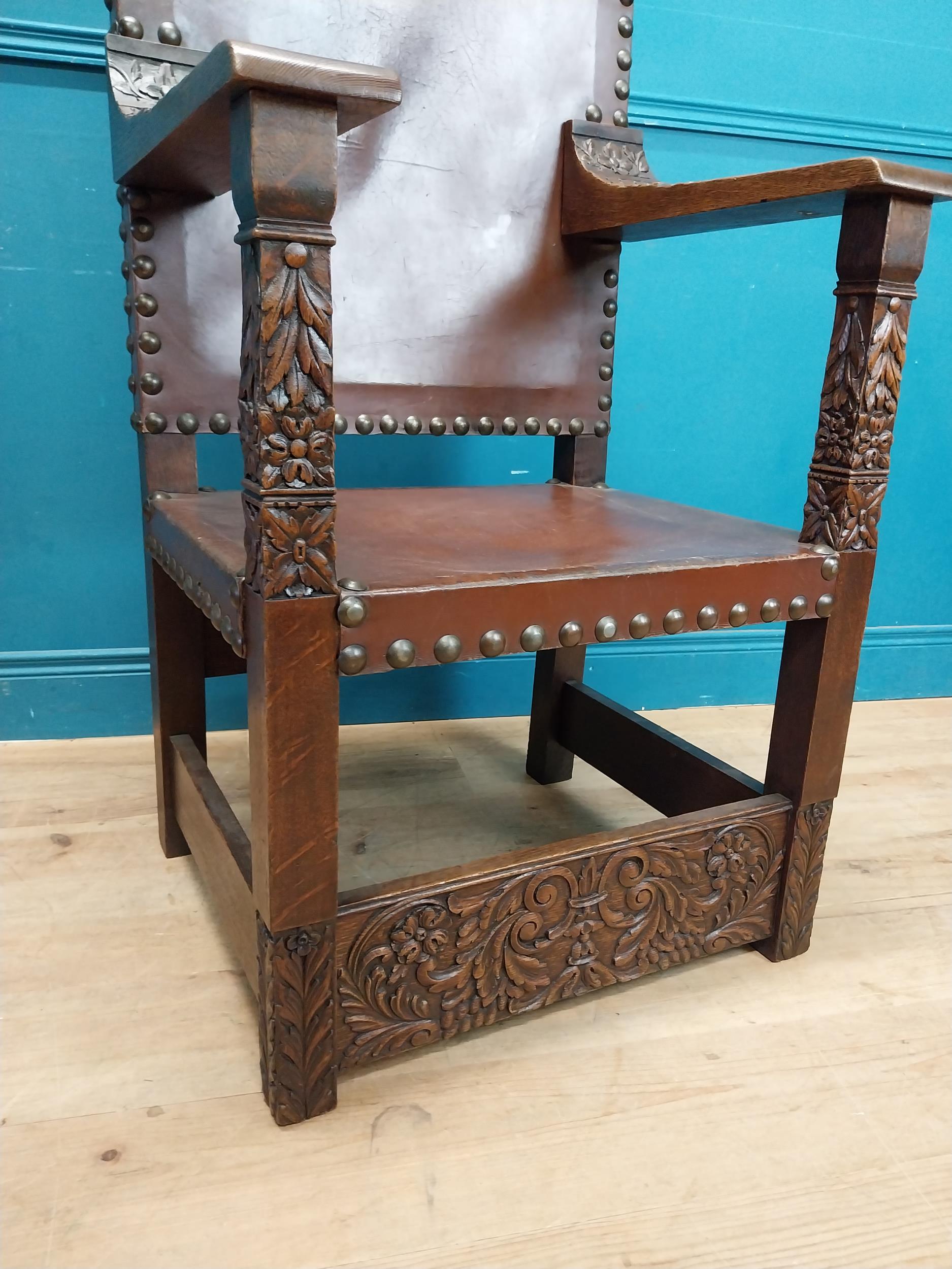 Edwardian carved oak and leather upholstered throne chair. {165 cm H x 63 cm W x 55 cm D}. - Image 9 of 9