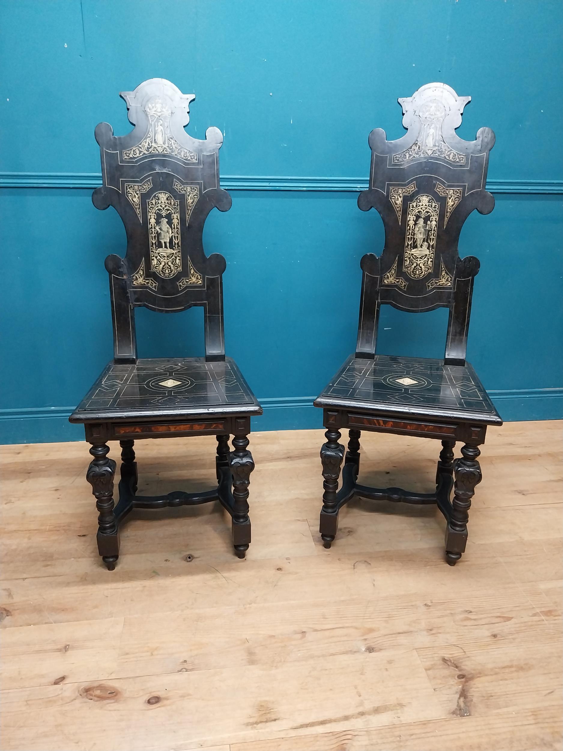 Pair of Aesthetic Movement ebonised hall chairs with inlaid bone decoration of Grecian imagery. {126 - Image 2 of 16