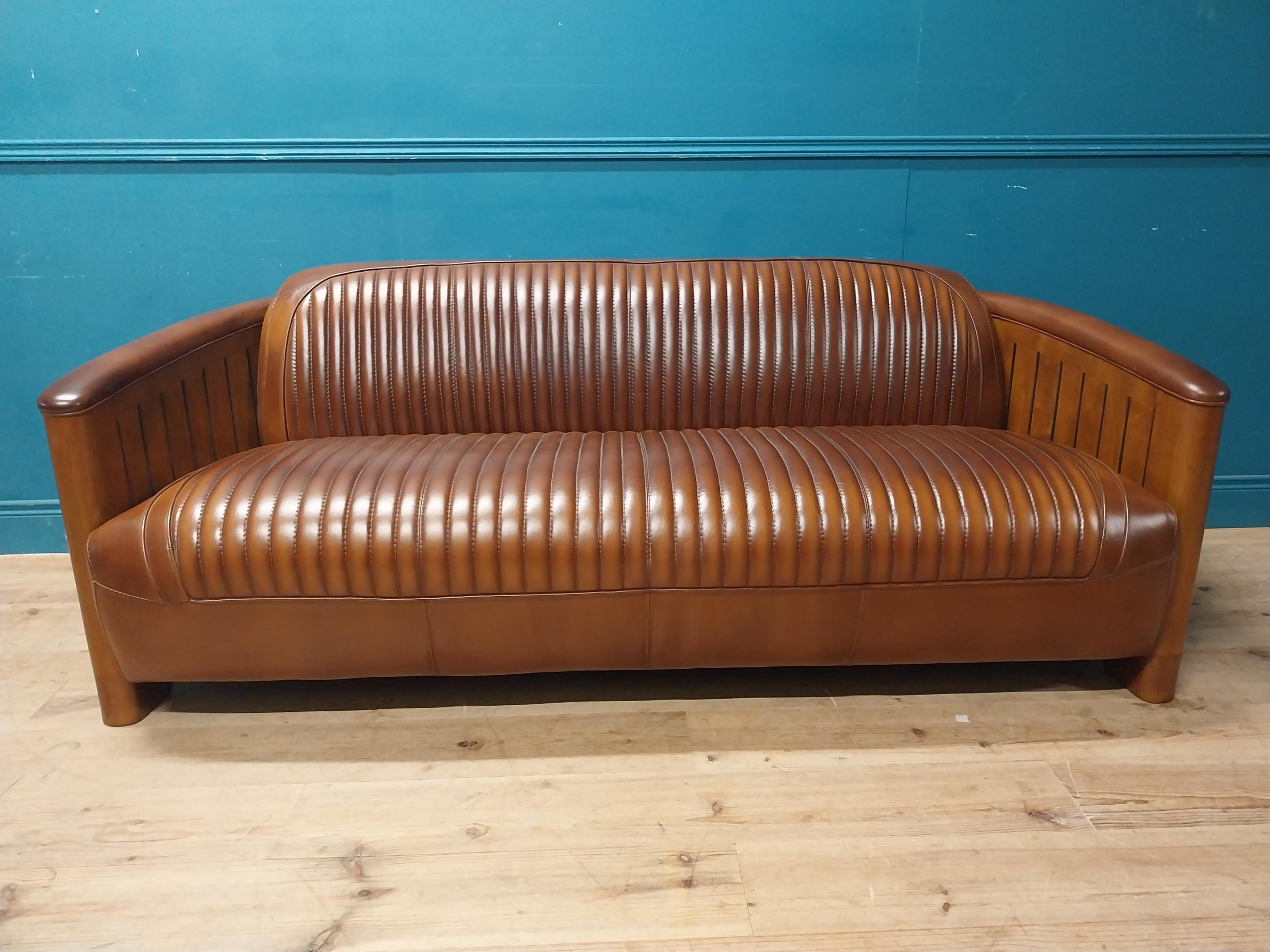 Exceptional quality hand dyed leather and cherrywood Aviator sofa. {} - Image 3 of 11