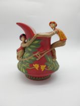 Early 20th C. ceramic jug with monkey handle decoration. {26 cm H x 23 cm W x 18 cm D}.