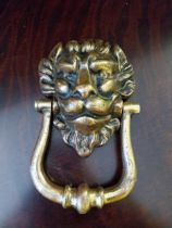 Lions mask brass door knocker {19 cm H}.